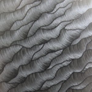 stainless steel embossed sheet with dune pattern, flowing sand-like textured decorative metal panel