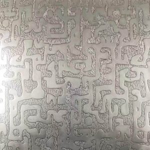 stainless steel embossed sheet with ancient script pattern, carved text texture for decorative metal panel