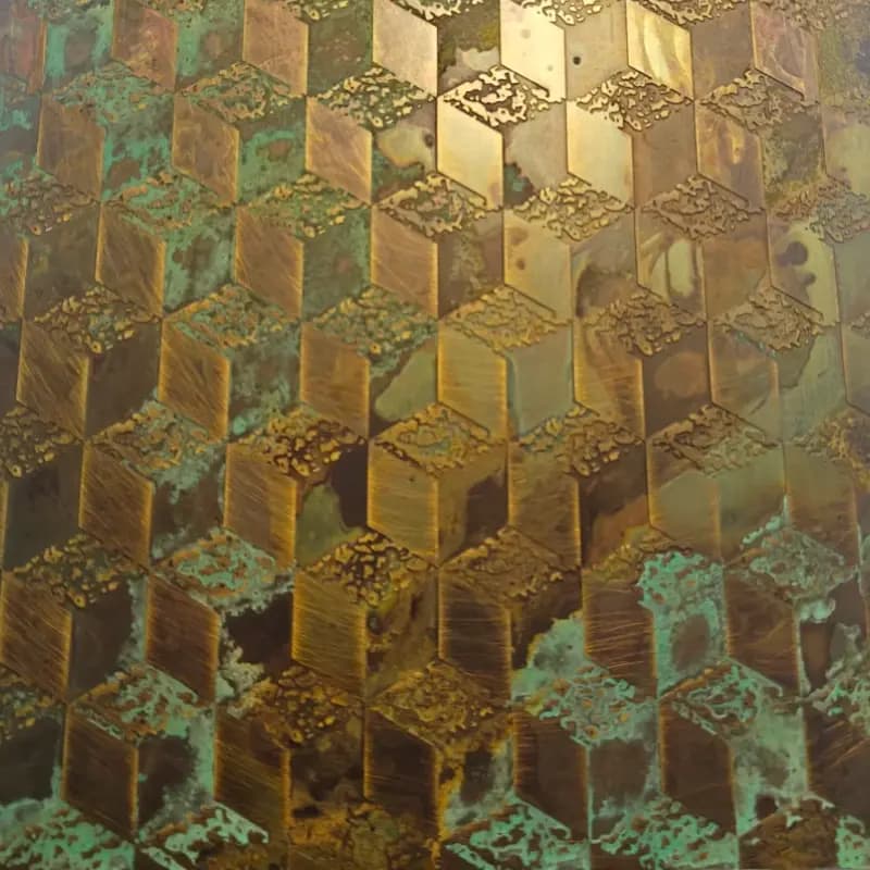 Antique stainless steel sheet with protective film showing distressed metallic surface
